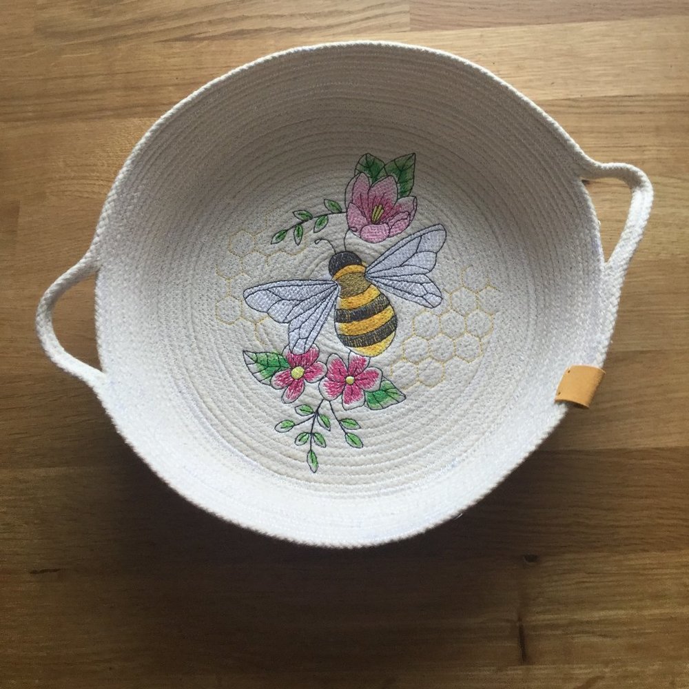 100% New hand crafted embroidered rope basket 11" across